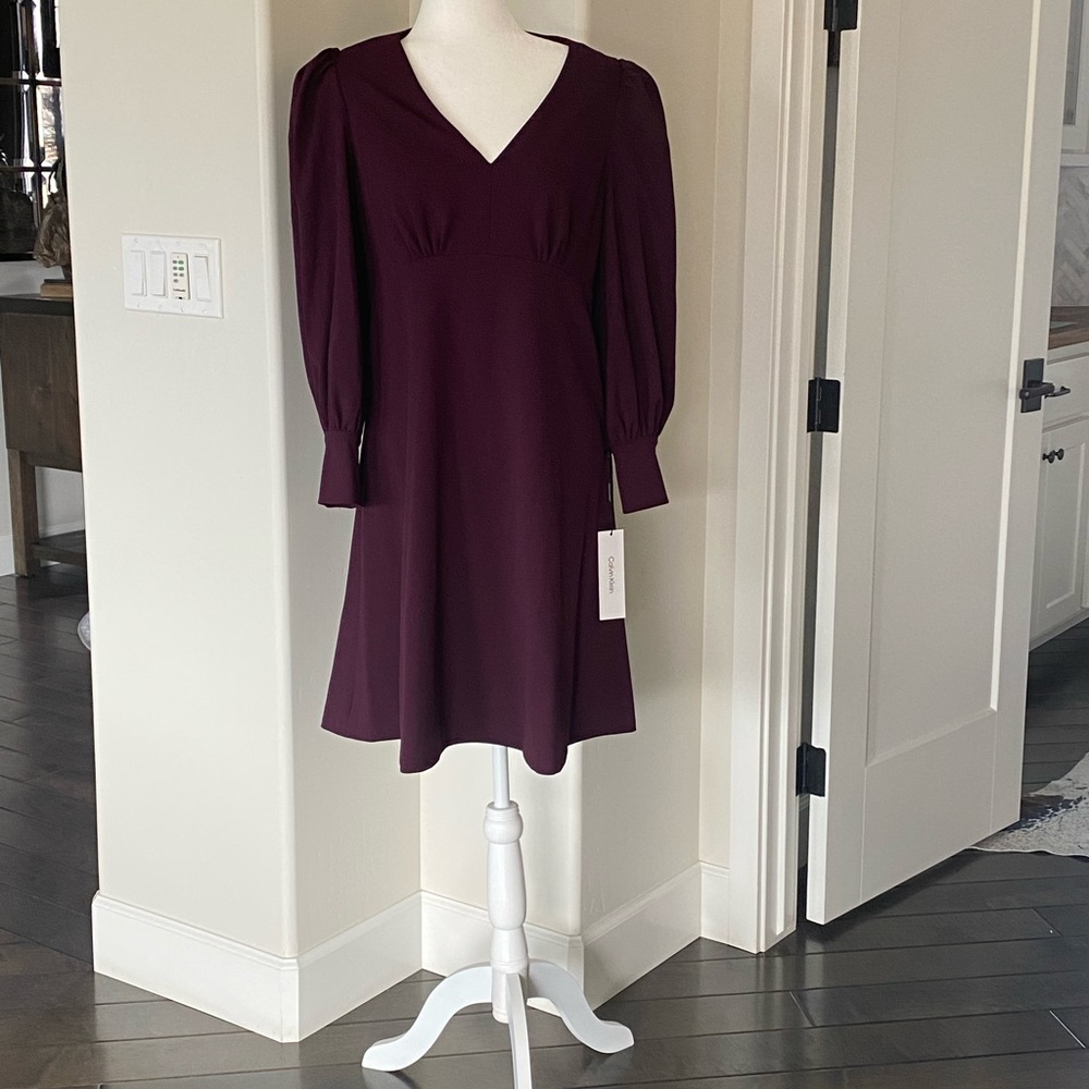 Calvin Klein a-line long sleeve v-neck scuba crepe dress.